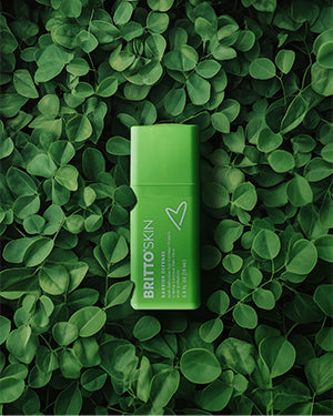 A product photo of the Barrier Defense Eye Contour Cream surrounded by Moringa Leaves.