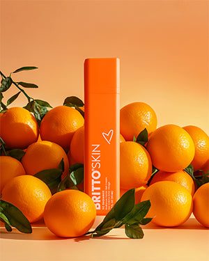 A product photo of the 5C Radiance Facial Gel Cream, surrounded by oranges.