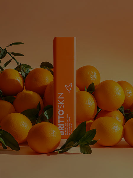 A Product photo of the 5C Radiance Facial Gel Cream, surrounded by Oranges