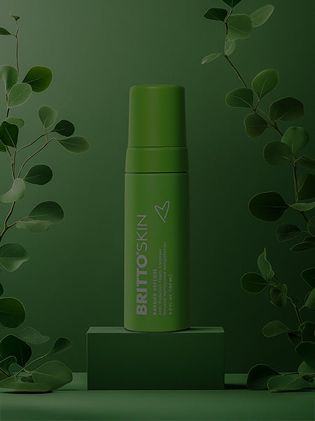 A Product photo of the Barrier Defense Foamer in a green background