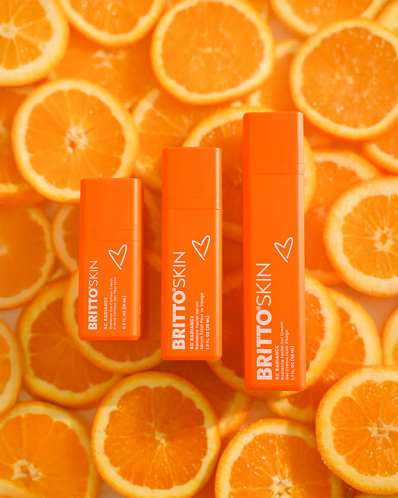 A product photo of the 5C Radiance line, on top of many slices of oranges.